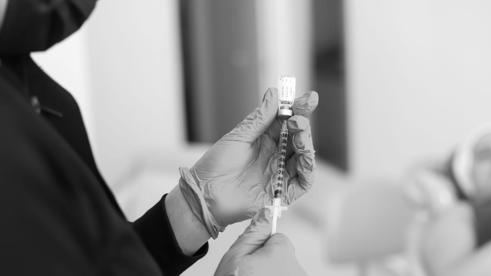 A clinician drawing a weekly GLP-1 dose from a vial into a syringe at OC Weight Loss and Med Spa in Mission Viejo