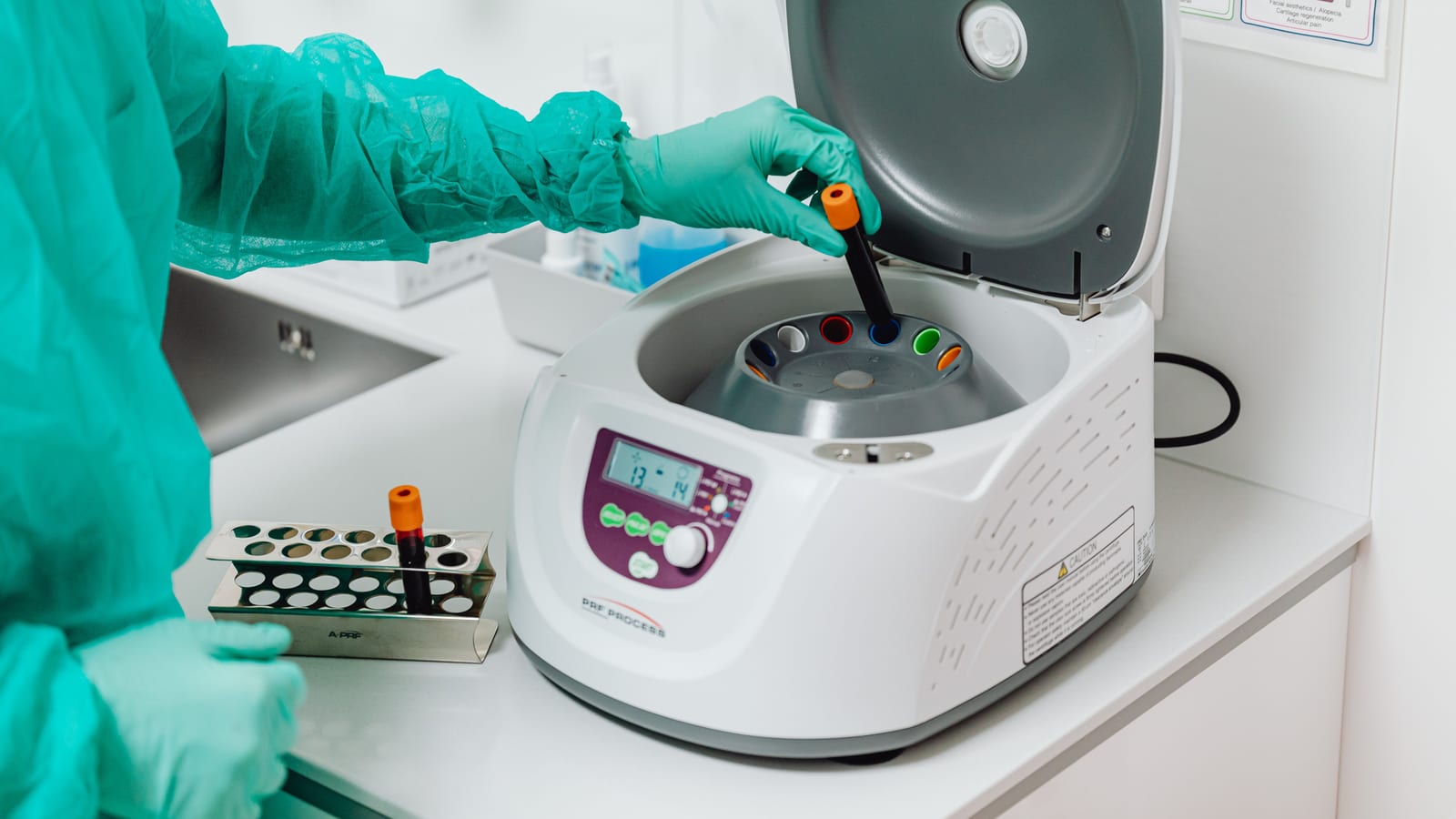 Blood tubes being spun in a centrifuge to separate platelet-rich plasma at OC Weight Loss and Med Spa in Mission Viejo